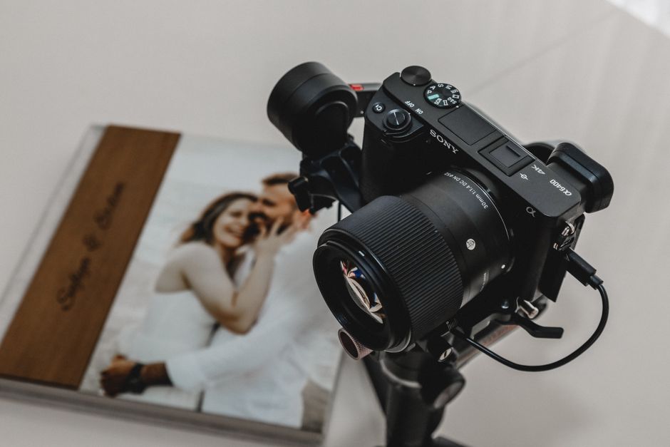 Wedding photographer holding a camera